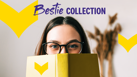 A woman peeks over the top of an open book.