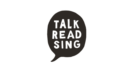 Speech bubble with Talk, Read, Sing inside it.