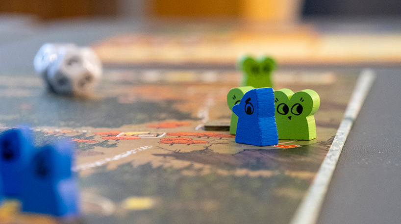 Mouse and bird character pieces from a board game