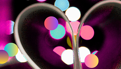 Abstract image of pink lights and heart shape.